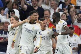 Jude Bellingham (snd left) celebrates his late winning goal for Real Madrid against Barcelonat (AP PHOTO)