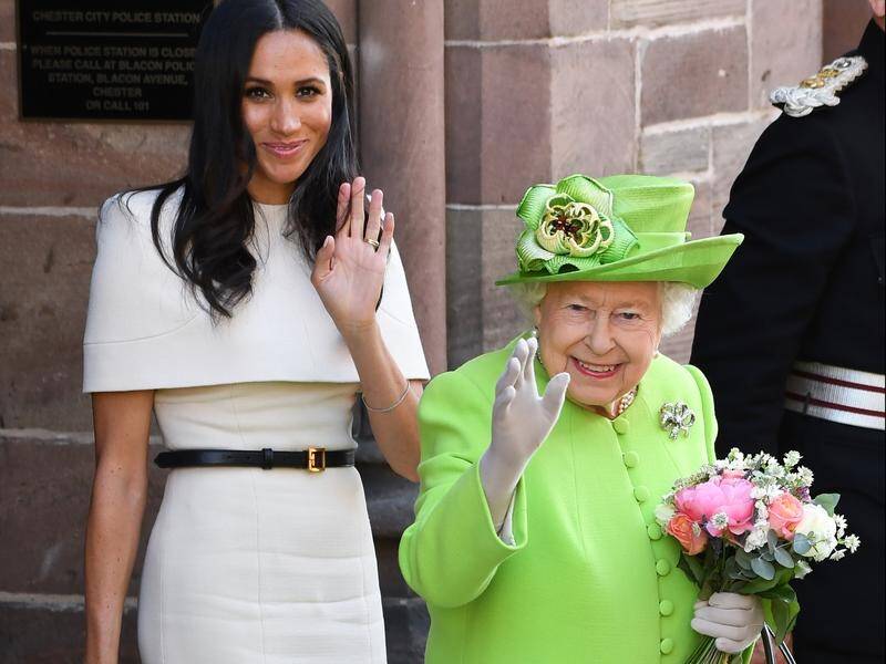 The Queen and the Duchess of Sussex have been greeted with cheers on their first outing together.