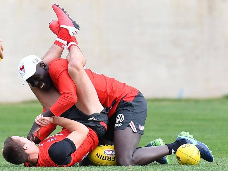Former Sydney Swans teammates Aliir Aliir and Will Hayward come up against each other on Saturday.