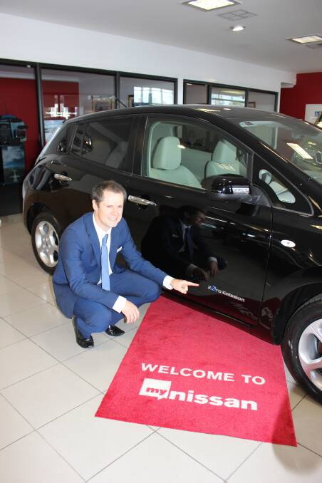 SWITCHED ON: Mayor of Dubbo Mathew Dickerson drives a fully electric car. Photo supplied