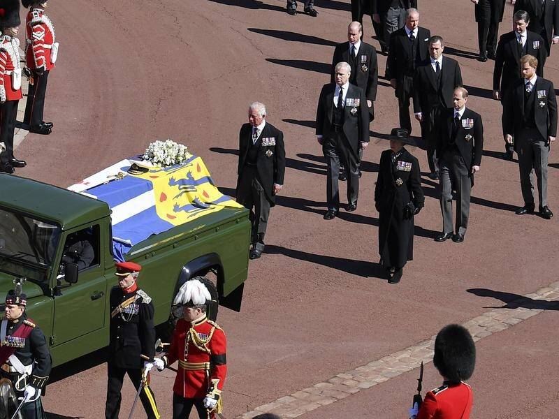 Family members followed the coffin arriving at St George's Chapel for the funeral of Prince Philip.
