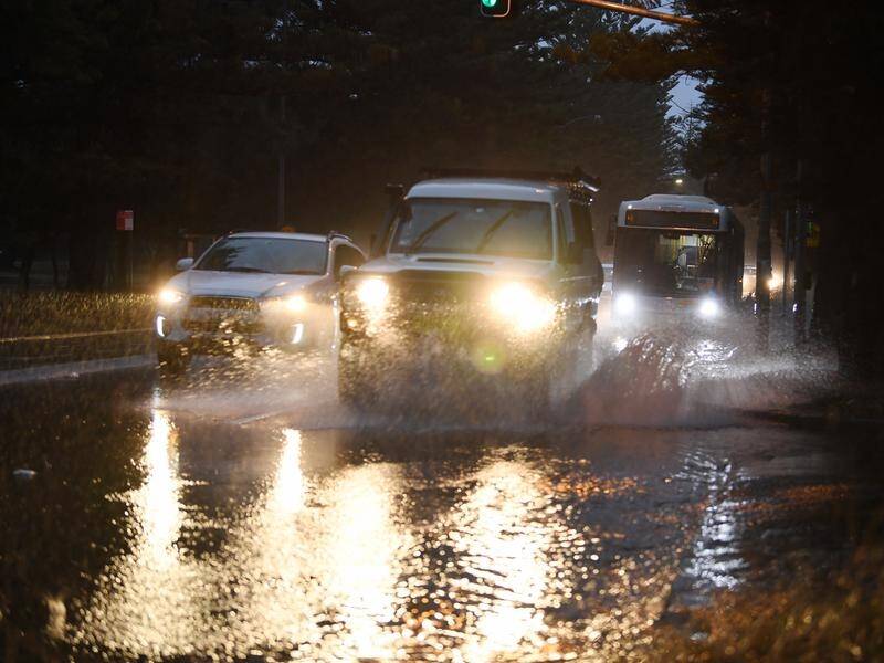 The NSW coastline is being battered with rain, while snow is falling in other parts of the state.