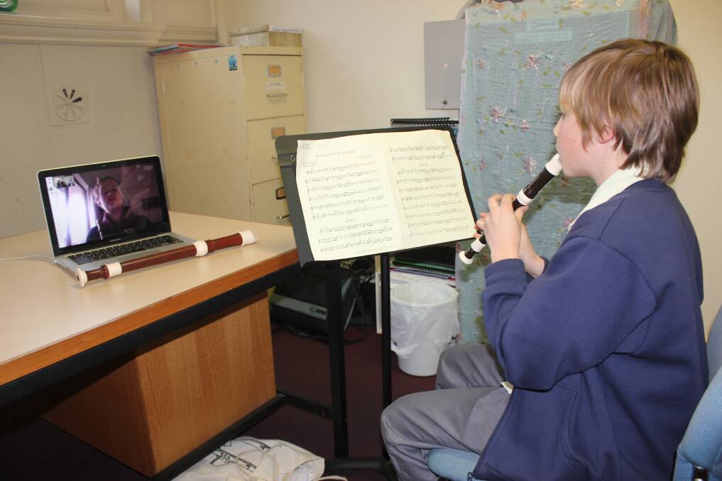 LESSONS: Alexei's recorder teacher Hannah Coleman teaches the lessons via Skype from her home in Melbourne. Photo: Antony Dubber