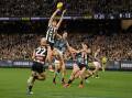 Mason Cox takes a superb mark in Collingwood's thrilling four-point win over Carlton.