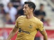 Barcelona have signed Robert Lewandowski, but are still don't know if they will be able to play him. (AP PHOTO)