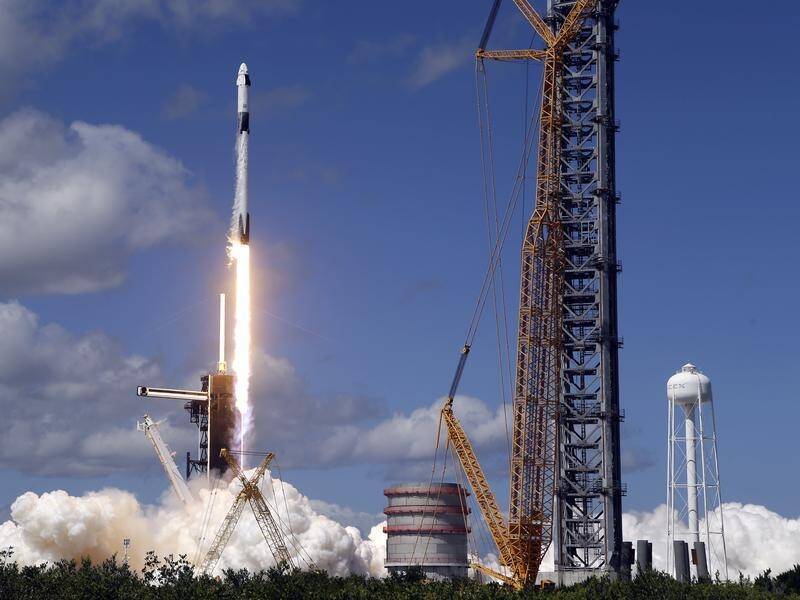A SpaceX Falcon 9 rocket carrying a Crew Dragon capsule has lifted off from Kennedy Space Center. (AP PHOTO)