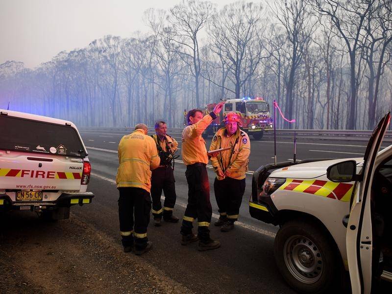 Emergency warnings have been issued as more than 100 fires continue to burn in NSW.