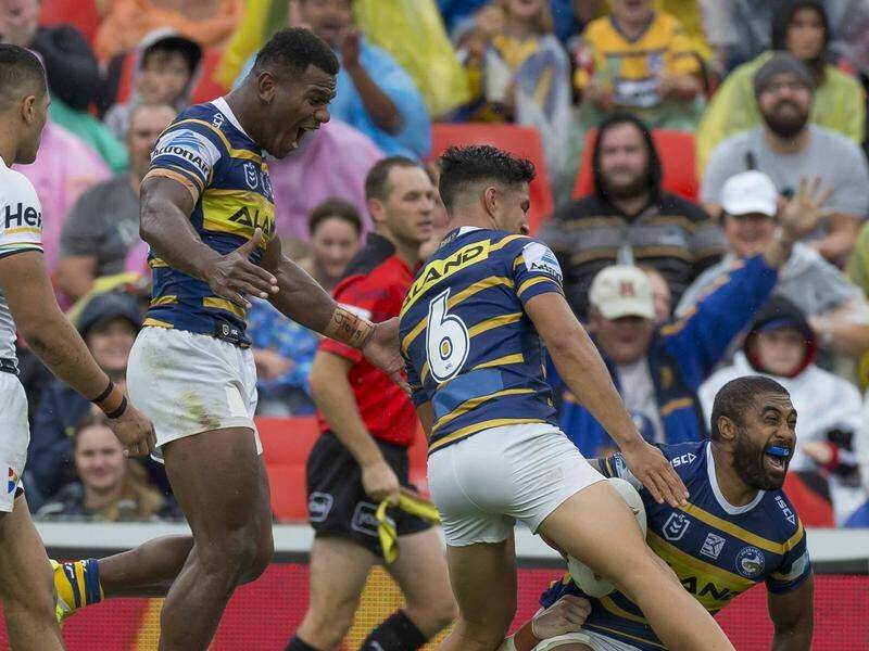 Parramatta have scored a 20-12 NRL win over Penrith, with Michael Jennings (R) bagging two tries.