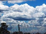 If new laws pass this week some the recently released detainees could be back behind bars. (Dave Hunt/AAP PHOTOS)