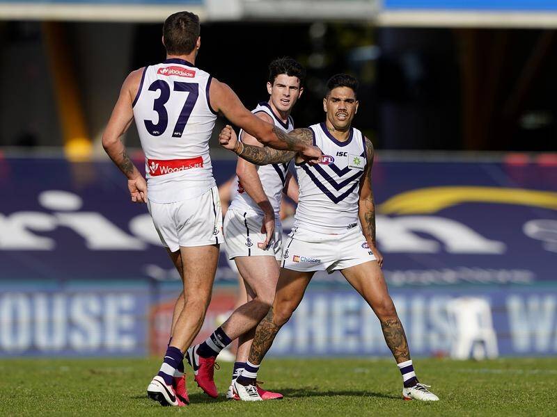 Michael Walters (r) put in a star turn in the Dockers' 20-point AFL win over Adelaide.