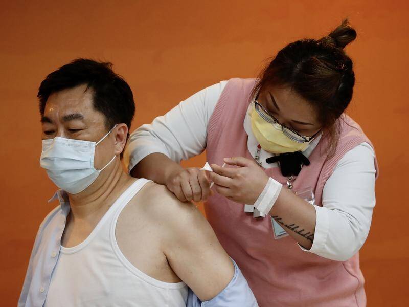 Taiwan is scrambling to get vaccines as its stock runs out amid a surge in infections.