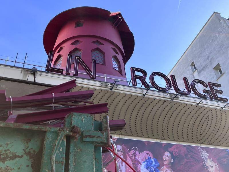 Part of the facade of the Moulin Rouge (Red Mill) cabaret in Paris has fallen down. (AP PHOTO)