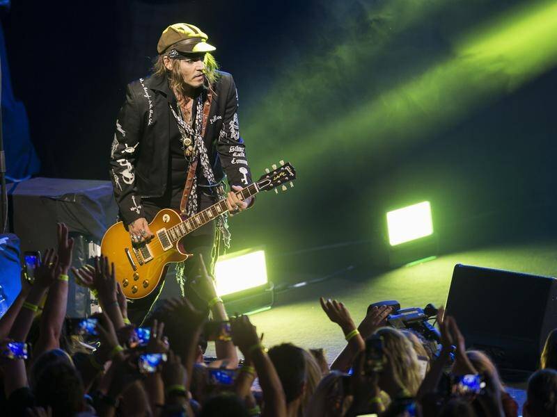 Johnny Depp, Alice Cooper and Aerosmith's Joe Perry have performed together in Switzerland.