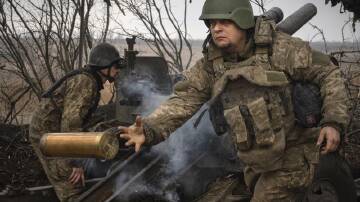 Ukrainian troops are on the back foot on the battlefield and face shortages of artillery supplies. (AP PHOTO)