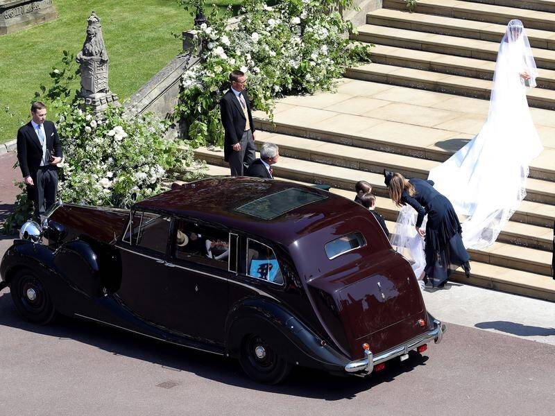 Meghan Markle arrived at St George's Chapel for her wedding in a Rolls Royce.