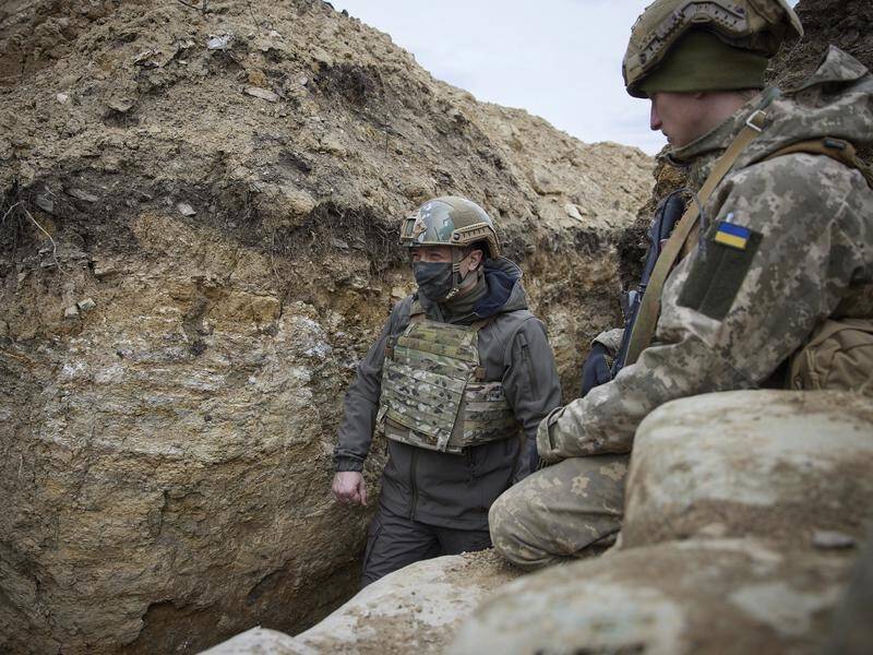 Ukrainian President Volodymyr Zelenskiy has visited his country's soldiers in the Donbas region.