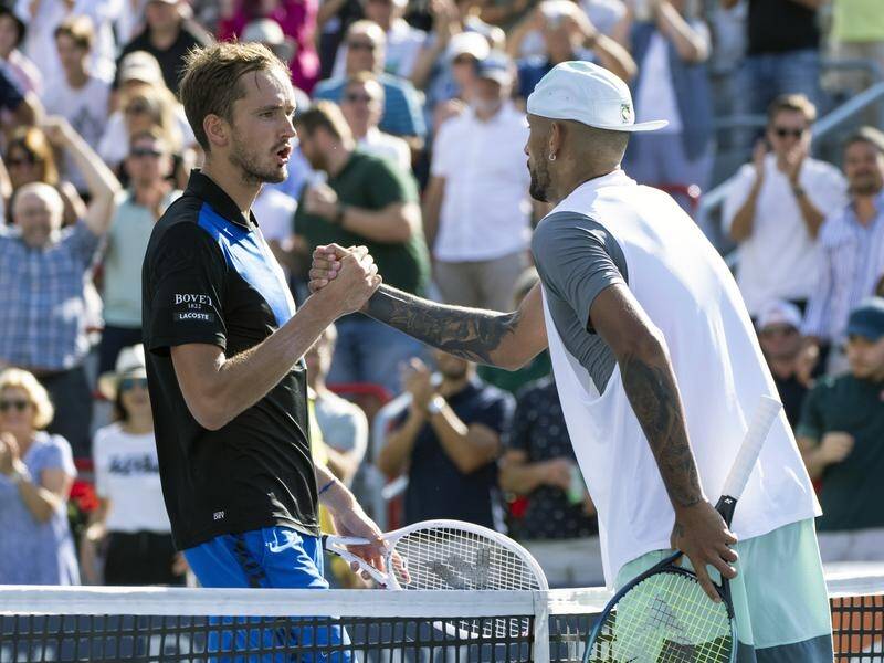 Nick Kyrgios (R) being congratulated by Daniil Medvedev after their recent Montreal clash. (AP PHOTO)