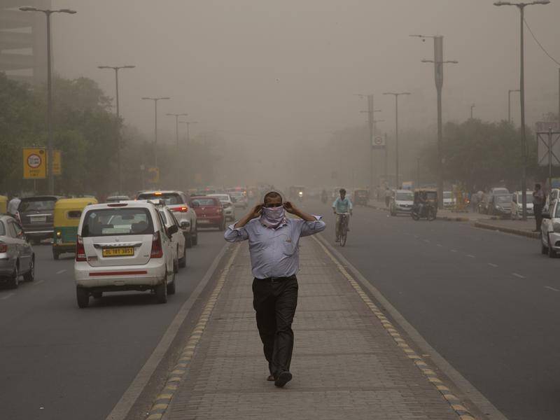 A thick blanket of dust has enveloped large swathes of the Indian capital New Delhi.
