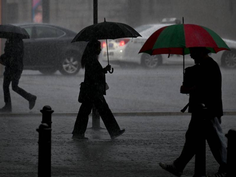 Sydney and southern parts of NSW have been hit by heavy rain storms. (Dean Lewins/AAP PHOTOS)