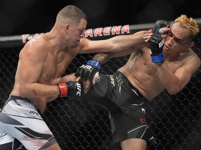 Nate Diaz (L) beat Tony Ferguson (R) in a welterweight bout during UFC 279 in Las Vegas. (AP PHOTO)