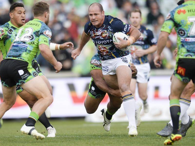 Matt Scott (C) has played 268 NRL matches for the Cowboys and will retire at the end of the season.