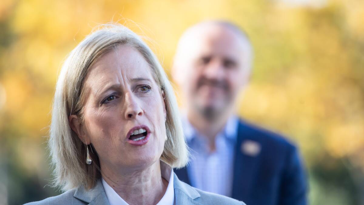 Minister for Public Service, Senator Katy Gallagher, and ACT Chief Minister Andrew Barr in the background. Picture: Karleen Minney