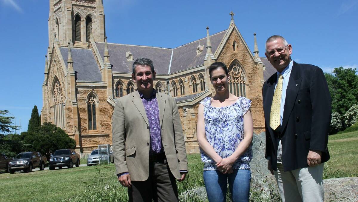 ADVOCATE: Goulburn’s Australia Day Ambassador for 2015 Warren Brown, Council’s executive support officer and co-ordinator of this year’s Australia Day celebrations Kristy-Jo Cooper and Mayor Geoff Kettle on the St Saviour’s Common recently. 