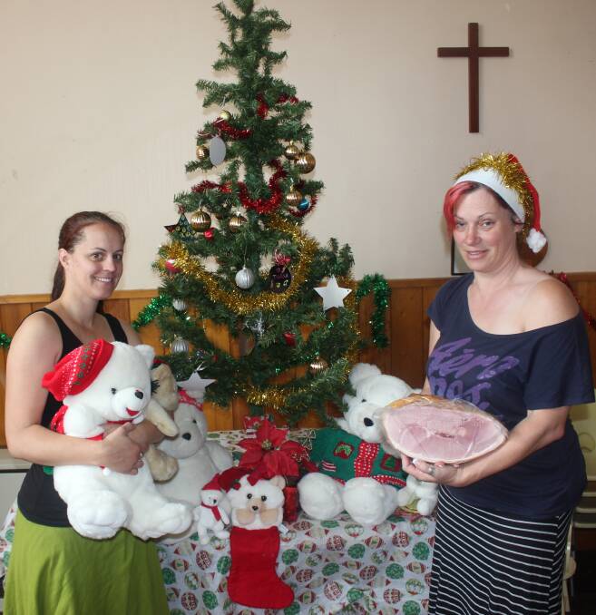 MERRY CHRISTMAS: Goulburn Uniting Church ministers Reverend Aimee Kent (left) and Reverend Julie Furner are excited about their Christmas Day Lunch to be held at the Wesley Centre in Goldsmith St this Thursday. (Photo: Antony Dubber) 