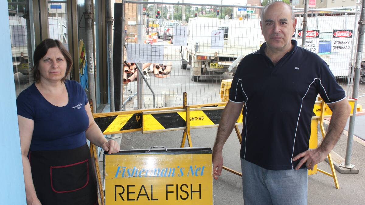 
FURY: Owners of the Goulburn Chargrill Chicken (also known as the ‘Fisherman’s Net), Tim and Rena Mavrothalassitis are angry about their shop being forced to close due to the work being carried out right next door on the extension of the Aldi supermarket.
