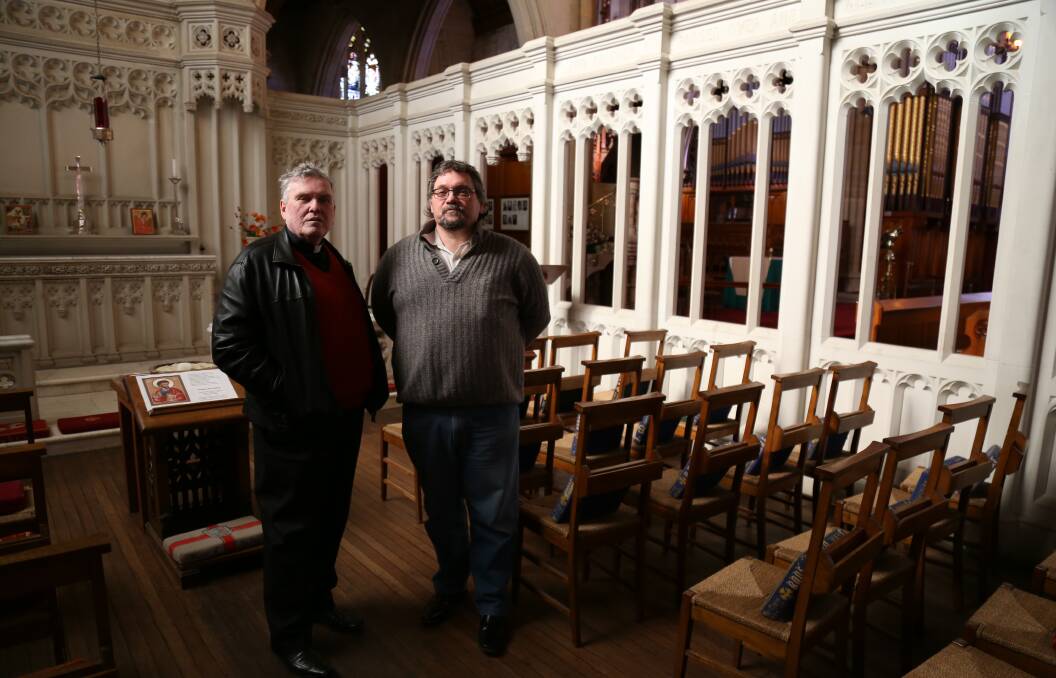 ENDANGERED: Dean, the Very Reverend Phillip Saunders, and chair of the Heritage Conservation Committee, John Quilter, stand in the Soldier's Chapel inside St Saviour's Cathedral.  Photos: Brittany Murphy