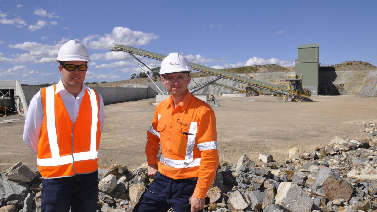  ROCK SOLID: Lynwood project head Shannon Ladewig (left) and site commissioning manager Mick Camilleri at the primary crushing area where hard rock is smashed to 500mm size before being sent via covered conveyor belt to a secondary and tertiary crushing unit.