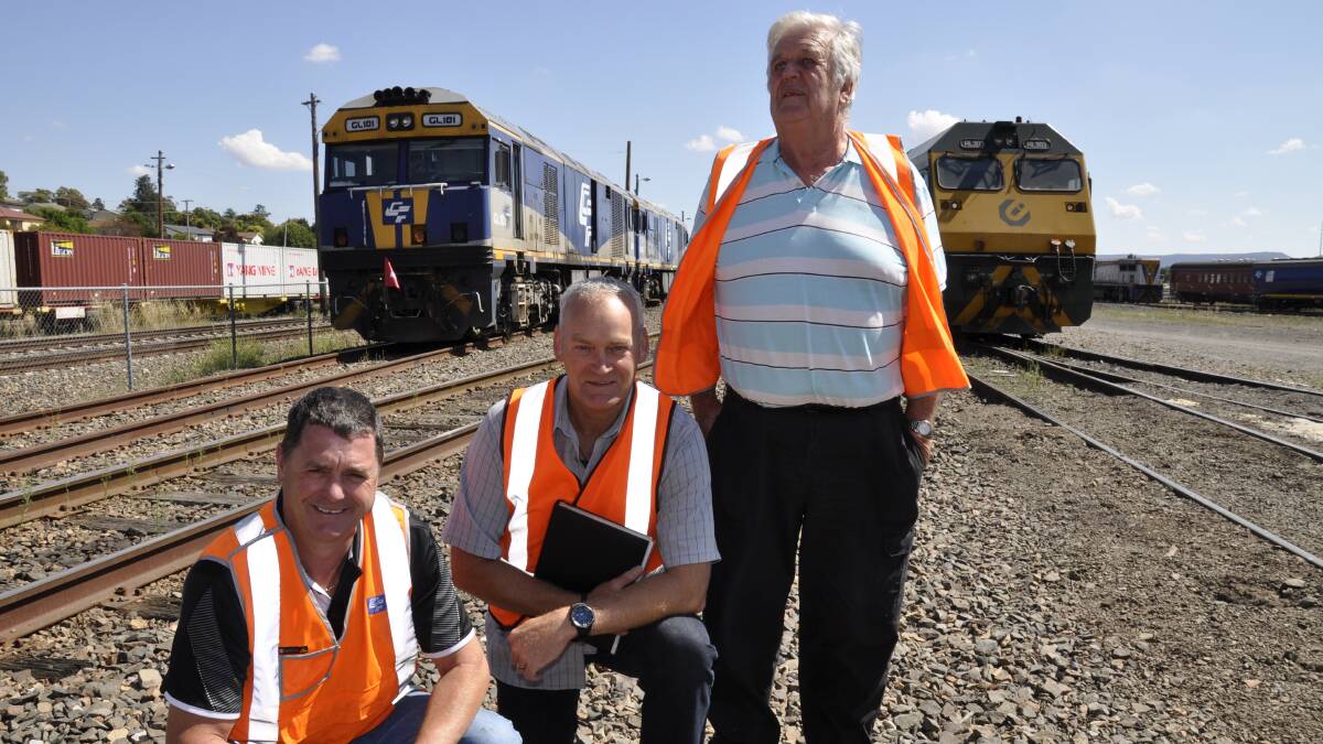 TIMBER TALKS: Chicago Freight Rail Services’ Goulburn workshop manager Mick Cooper (left) has met with IPP director Phil Jeune and Farm Forestry Consulting owner, Ian McArthur to discuss the imminent transport of forestry logs from the rail hub.