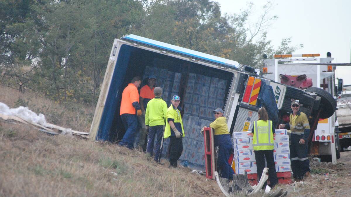 A truck carrying pies overturned on the Hume Highway near Bowning at around 10pm on Tuesday. Photo: Jessica Cole.
