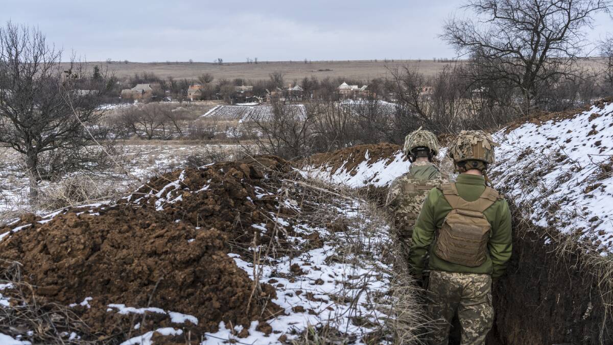 Ukrainian soldiers man a trench near the front line in the Ukrainian village of New York, formerly Novhorodske, on January 17. Picture: Getty Images