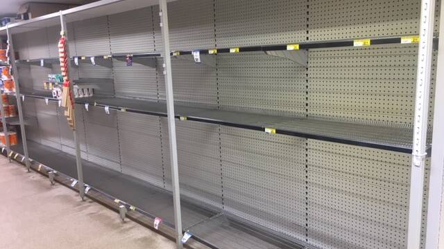 PANIC BUYING: Empty toilet paper shelves at Crookwell IGA. Photo: supplied