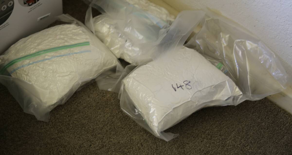 Officers uncover 30 kilograms of cocaine allegedly made at the Yass River Road property. Photo: NSW Police Force