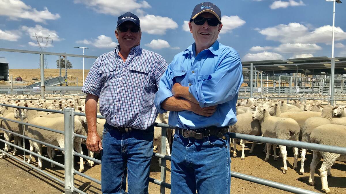 Brian Frost, Hillden at Bannister purchases the Top Priced Pen from Brent Medway, Tolldale Pastural Company at Gunning. Photo: Hannah Sparks