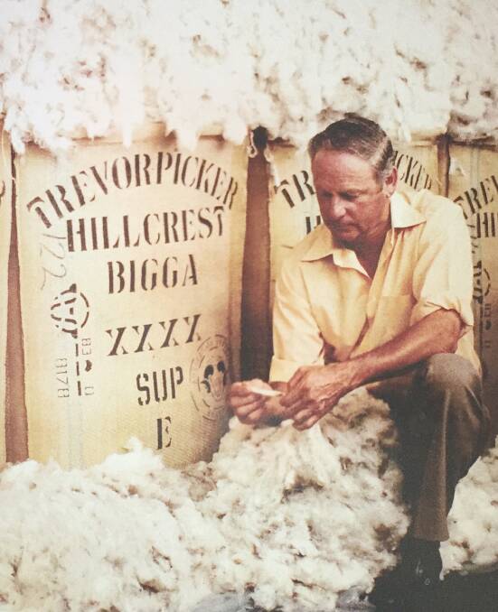 Wool master: Mr Picker tests and examines some sale wool from Hillcrest, Bigga at the wool store in Goulburn where he fetched record prices.