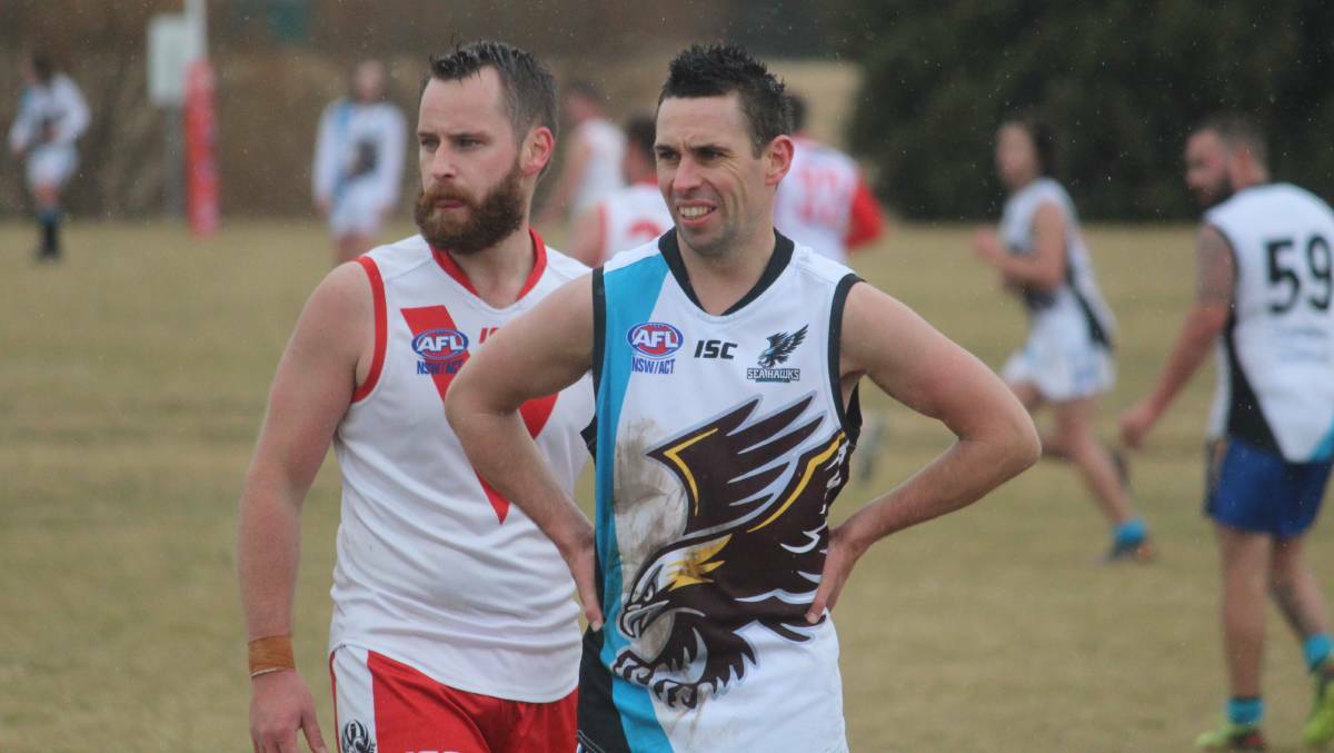Andrew Clark (left) in the inaugural Ovarian Cancer Awareness clash. Photo: Zac Lowe. 
