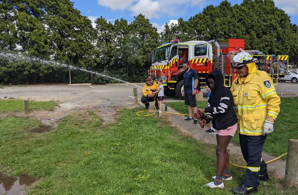 Children had a lot of fun using the fire hoses. Photo: supplied. 