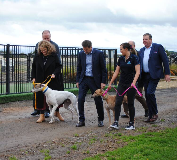 Examine: Goulburn MP Wendy Tuckerman, Hospitality and racing minister Kevin Anderson, Goulburn Mulwaree Council mayor Peter Walker and Greyhound Racing NSW CEO Rob Macaulay taking a walk along the proposed straight track. Photo: Burney Wong.