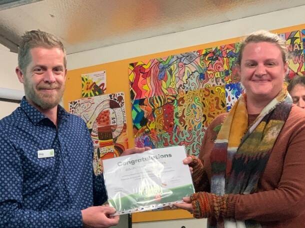 Greg Scheuner from Woolworths and Annette Carter with the Woolworths Junior Landcare cheque. Photo: supplied. 