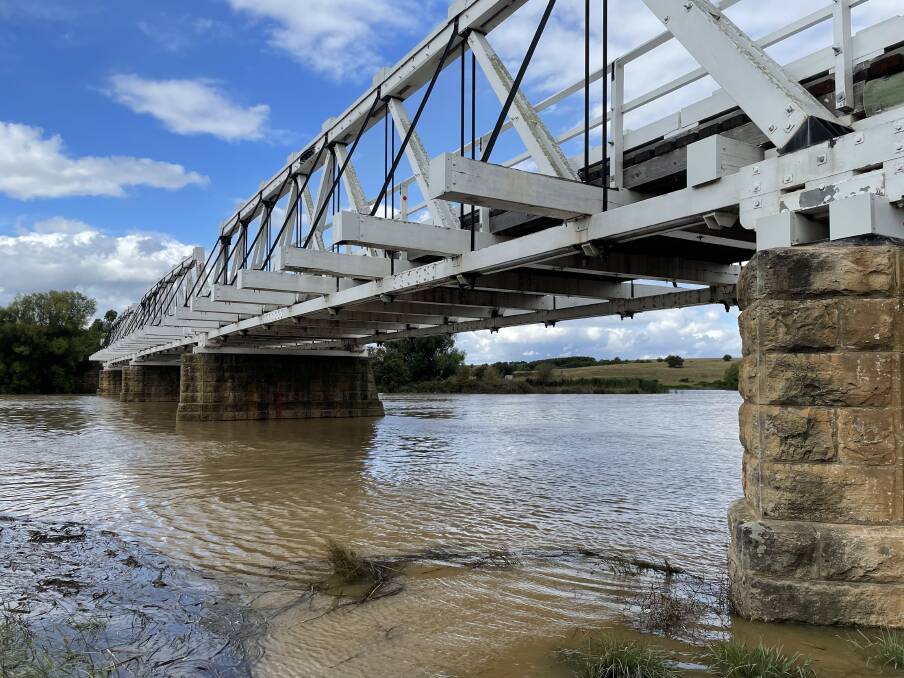 A grey Toyota Hilux crashed through the barriers of Rossi Bridge and went into the Wollondilly River. Photo: file. 