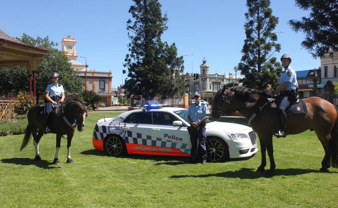 Horses Navajo and Prince with police at Belmore Park. Photo: Burney Wong. 
