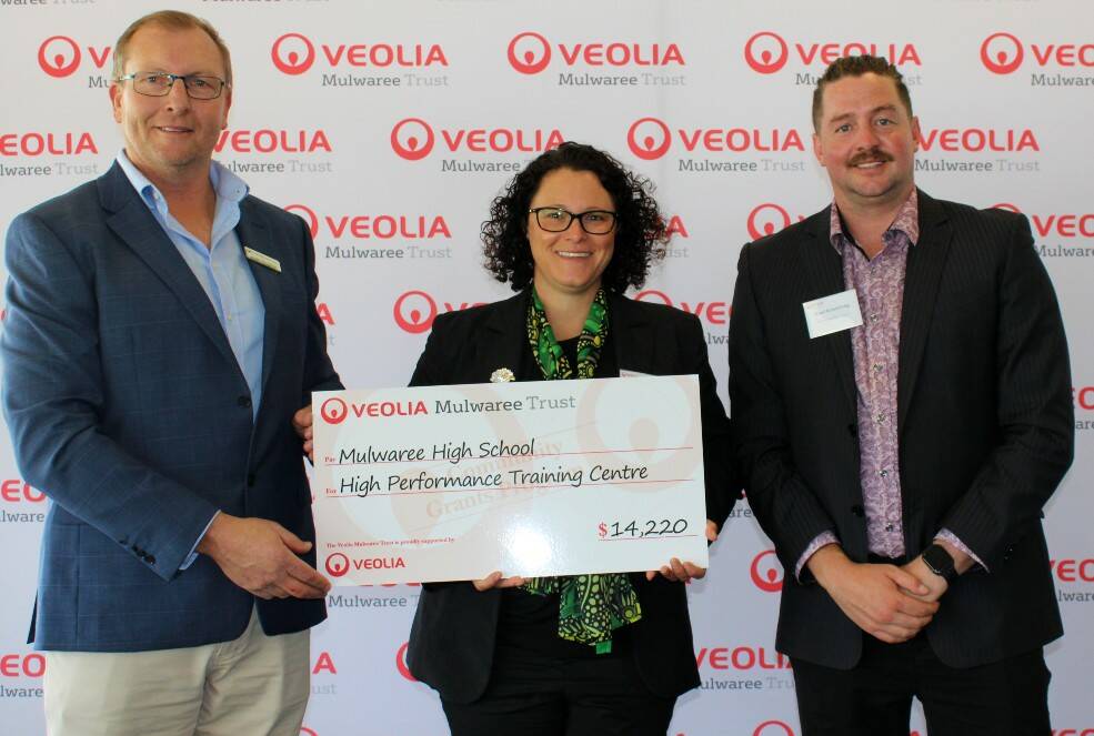 Veolia Mulwaree Trust's Justin Houghton with Mulwaree High School's Sally Curry and Brad Armstrong. Photo: supplied. 