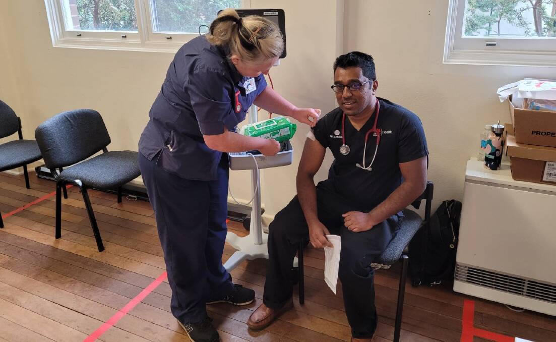 Dr Ganesh Ramanathan was the first person to receive the vaccine at Goulburn Base Hospital. Photo: Burney Wong. 