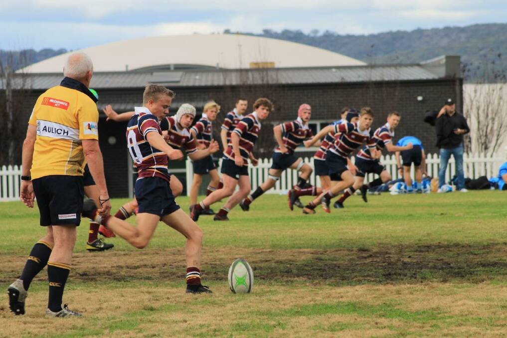 Trinity First XV kicking off in a recent rugby union game at Wexted Oval. Picture supplied.