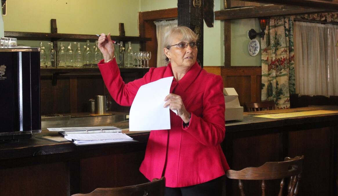 No bidders: Carol James conducting the auction at the Fireside Inn. Photo: Burney Wong. 