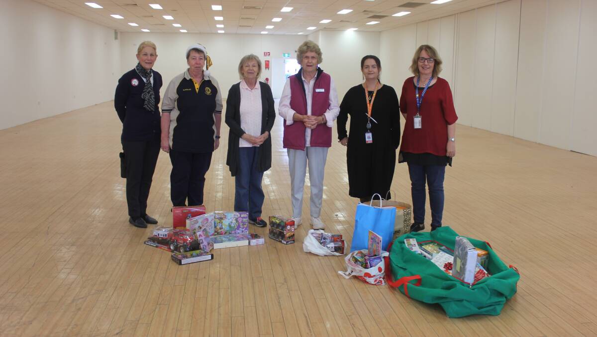 Goulburn City Lions Club member Maureen Strong, Lions Club president Rosemary Chapman, Ruth Vial and Wendy Wise from St Vincent de Paul, Venita Martin and Rose Bell from Charles Sturt University and the NSW Police Academy. Photo: Burney Wong. 