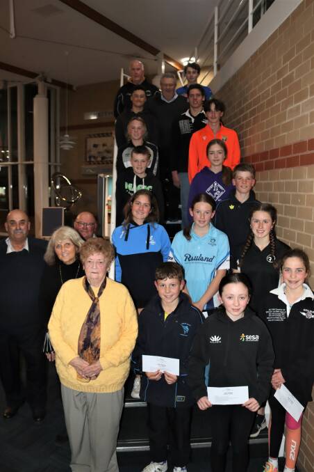 Recognised: Members of the Ray Harvey Sports Foundation Committee with this years recipients. Photo: Supplied. 